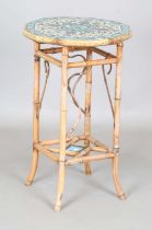 A late 19th century bamboo two-tier occasional table, the top inset with Isnik style glazed