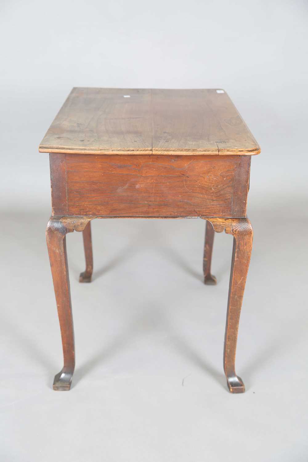An 18th century elm side table, the single drawer later carved with flowerheads, height 70cm, - Image 11 of 14
