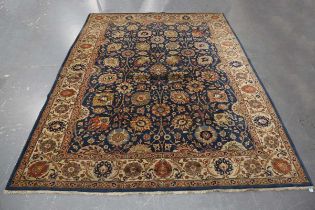 A Tabriz carpet, North-west Persia, early 20th century, the blue field with overall palmettes and