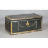 An early 19th century dark green leather and brass mounted camphor trunk, the lid with applied