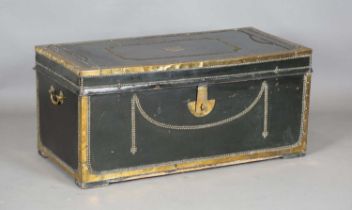 An early 19th century dark green leather and brass mounted camphor trunk, the lid with applied