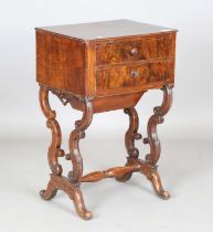 A late 19th century Continental walnut work table, raised on scroll legs, height 70cm, width 45cm,