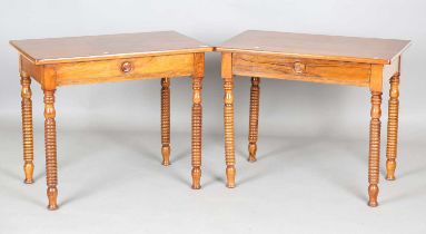 A pair of late 19th century Continental walnut side tables, each drawer with turned disc handle,