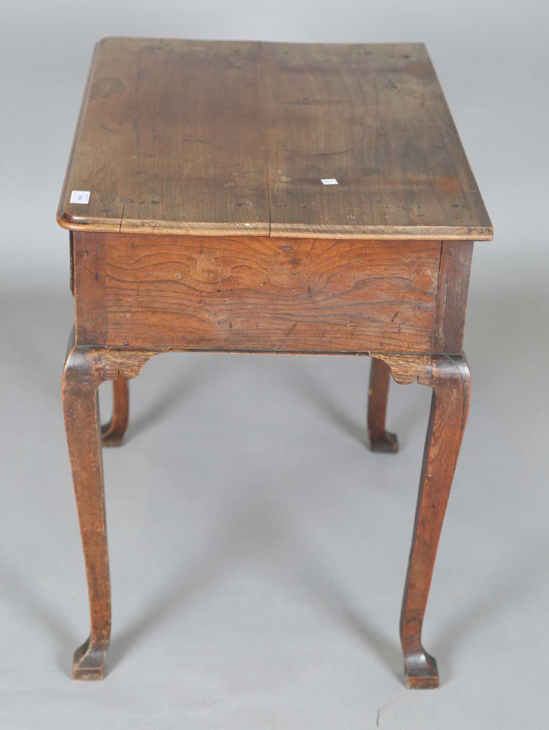 An 18th century elm side table, the single drawer later carved with flowerheads, height 70cm, - Image 14 of 14