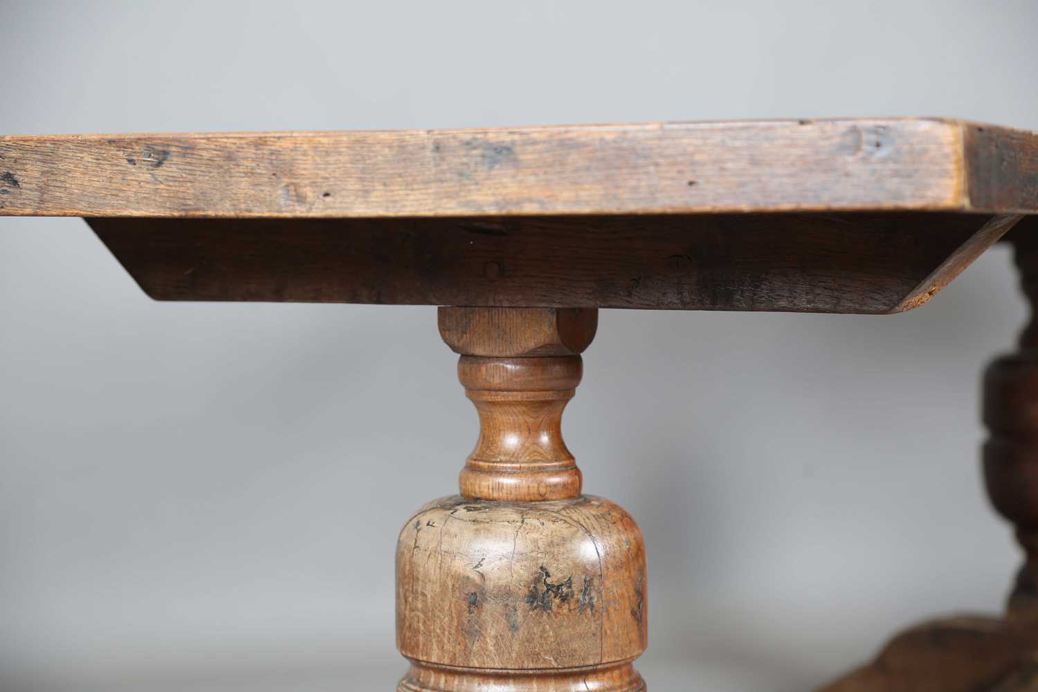 A 17th century style oak refectory table, the top with a walnut crossbanded border, height 74cm, - Image 7 of 17