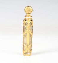 A late 18th century French gold mounted and glass scent bottle, with scallop shell stopper and