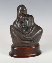 A late 20th century brown patinated cast bronze stylized figure group of a mother and child,