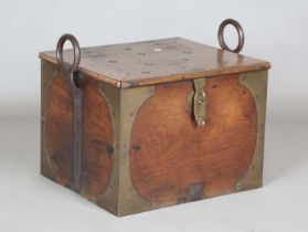 A 19th century Eastern hardwood travelling strong box, possibly Indian, heavily bound in brass and