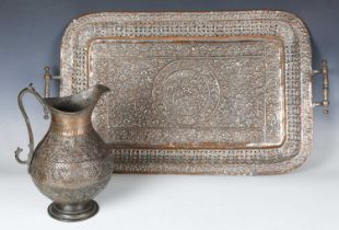 A 19th century Indian silvered copper tray, profusely chased with overall foliage, width 66cm,