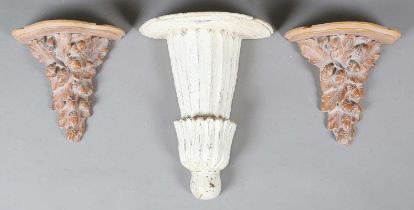 A 20th century white painted and carved softwood wall bracket, height 40cm, width 33cm, together