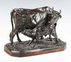 After Pierre-Jules Mêne - a late 19th century French brown patinated cast bronze model of a cow