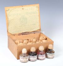 An early 20th century French cased set of liquid paints, the maker's label detailed 'Couleurs