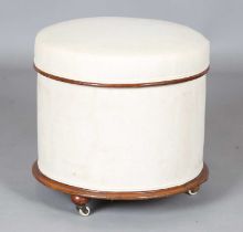 A mid-Victorian mahogany framed cylindrical box seat ottoman, height 43cm, diameter 45cm.