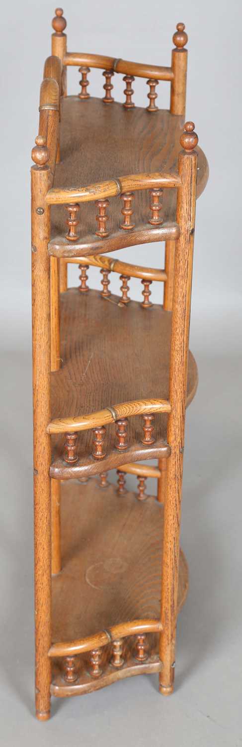 An early 20th century ash and bentwood three-tier wall shelf with applied gilt metal mounts, - Image 5 of 7