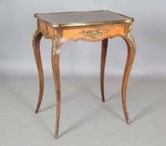 An early 20th century Louis XV style walnut and kingwood side table with gilt metal mounts and