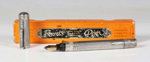 A rare T.B. Ford silver overlaid 'Short Standard' fountain pen, the nib detailed 'Warranted 1st