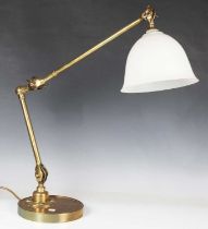 A 20th century brass adjustable table lamp with frosted glass shade, diameter of base 19cm (crack to