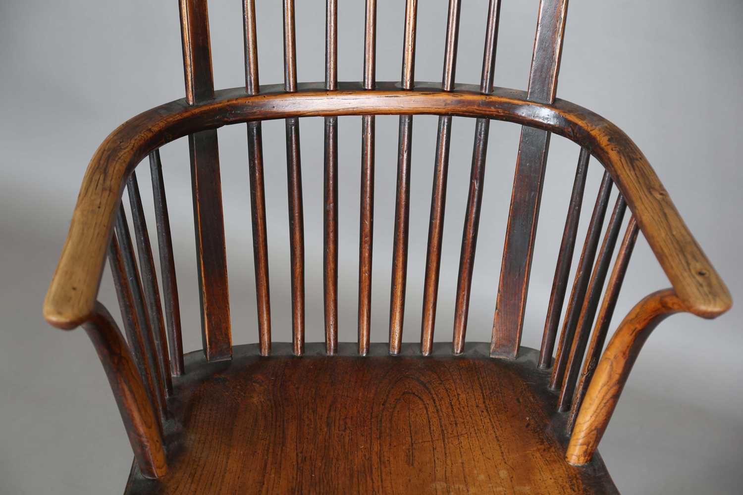 A mid-19th century provincial ash and elm bar and stick back Windsor armchair with a wide elm seat - Image 3 of 9