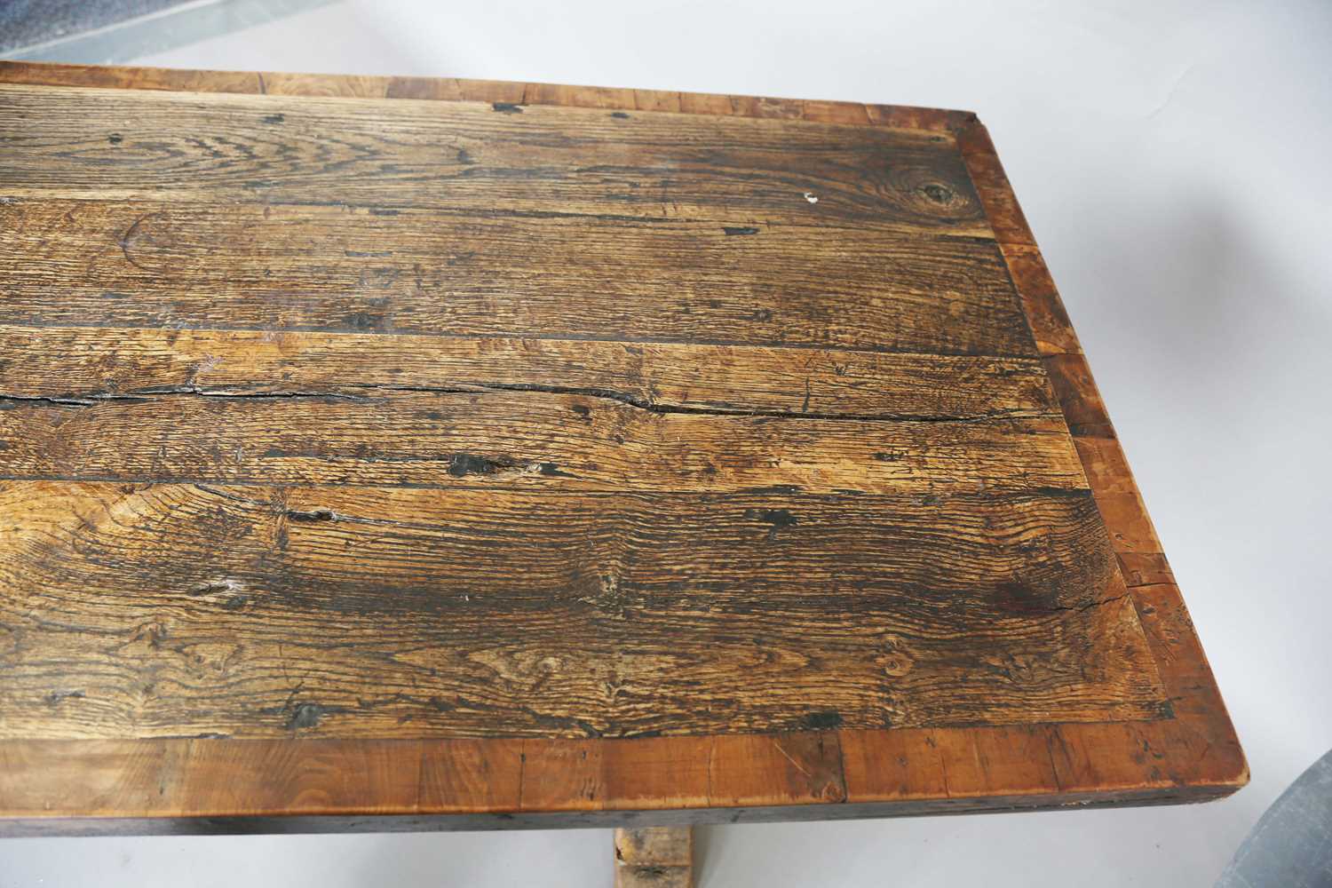 A 17th century style oak refectory table, the top with a walnut crossbanded border, height 74cm, - Image 5 of 17