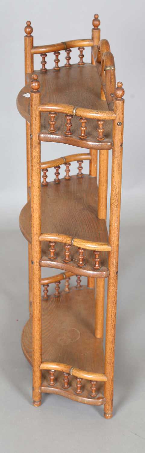 An early 20th century ash and bentwood three-tier wall shelf with applied gilt metal mounts, - Image 7 of 7