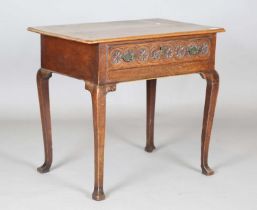 An 18th century elm side table, the single drawer later carved with flowerheads, height 70cm,