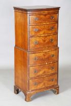 A mid-20th century reproduction walnut bowfront tallboy, height 130cm, width 55cm, depth 41cm.