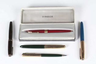 A Parker Vacumatic gilt metal mounted fountain pen, a Parker ‘17’ gilt metal mounted red plastic