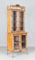 A 19th century French bamboo and rattan bookcase cabinet, height 197cm, width 77cm, depth 44cm.