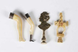 A group of four novelty pipe tampers, comprising two mother-of-pearl and white metal mounted ladies'