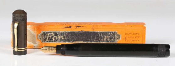 A rare T.B. Ford black hard rubber cased 'Magnum' fountain pen, the nib detailed 'Ford 428 Mill 14