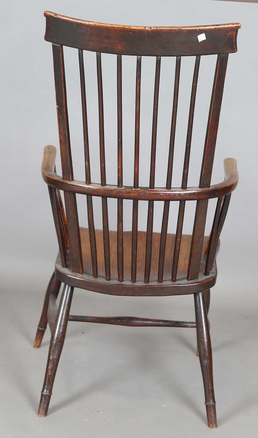 A mid-19th century provincial ash and elm bar and stick back Windsor armchair with a wide elm seat - Image 9 of 9
