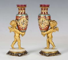 A pair of late 19th century French gilt bronze and champlevé enamel figural spill vases, each finely