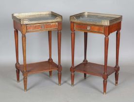 A pair of late 19th century French Empire style mahogany bedside tables, inset with green marble