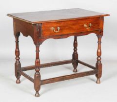 An early 18th century and later oak side table, fitted with a single frieze drawer, height 72cm,