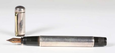 A rare T.B. Ford plated metal overlaid 'Standard' fountain pen, the nib detailed 'Ford 428 Mill 14