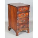 A George III and later mahogany pedestal chest of three drawers with applied cast metal handles,