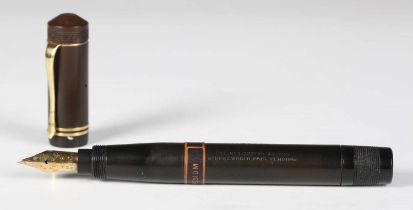 A rare T.B. Ford black hard rubber cased 'Short Standard' fountain pen, the nib detailed 'Ford 428