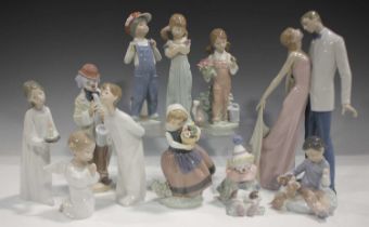 Eleven Lladro figures, including Pierrot with Puppy, No. 5277, Spring, No. 5217, Growing Up