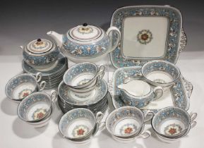 A Wedgwood Florentine Turquoise pattern part service, comprising teapot and cover, milk jug, sugar