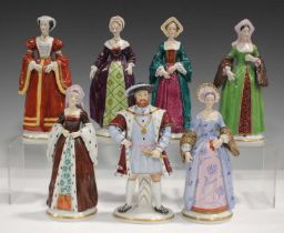 A set of Sitzendorf porcelain figures, modelled as Henry VIII and his six wives, each with painted