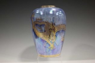 A Wedgwood ordinary lustre vase, 1920s, designed by Daisy Makeig-Jones, decorated in gilt with a