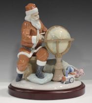 A Lladro limited edition figure group Christmas Journey, No. 1813, designed as Father Christmas