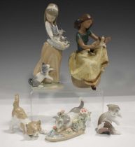 A Lladro gres stoneware figure of a girl with a cat, Repose, No. 2169, a Lladro girl Following Her