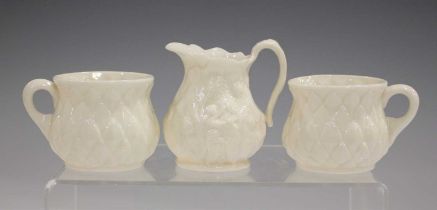 A mixed group of Belleek porcelain, teawares and decorative pieces, dating from the First Period all