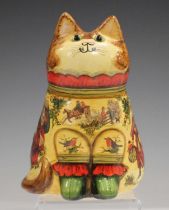 A Joan and David De Bethel Rye Pottery Christmas cat, dated 1998, with découpage figures and