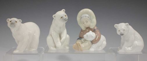A Lladro figure Eskimo Boy Playing, No. 1195, boxed, three Lladro polar bears, a Lladro goose and