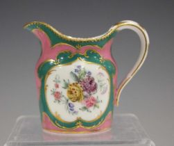 A Sèvres porcelain cream jug, circa 1762, painted with opposing fruit and floral panels within