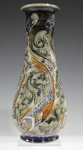 A Royal Doulton stoneware vase, decorated by Mark V. Marshall, monogrammed, with fish amidst