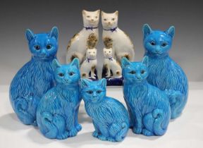 A large mixed group of pottery and porcelain cats, British and Continental, late 19th and 20th