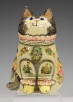 A Joan and David de Bethel Rye Pottery cat, dated 1989, with découpage figures, flowers and romantic